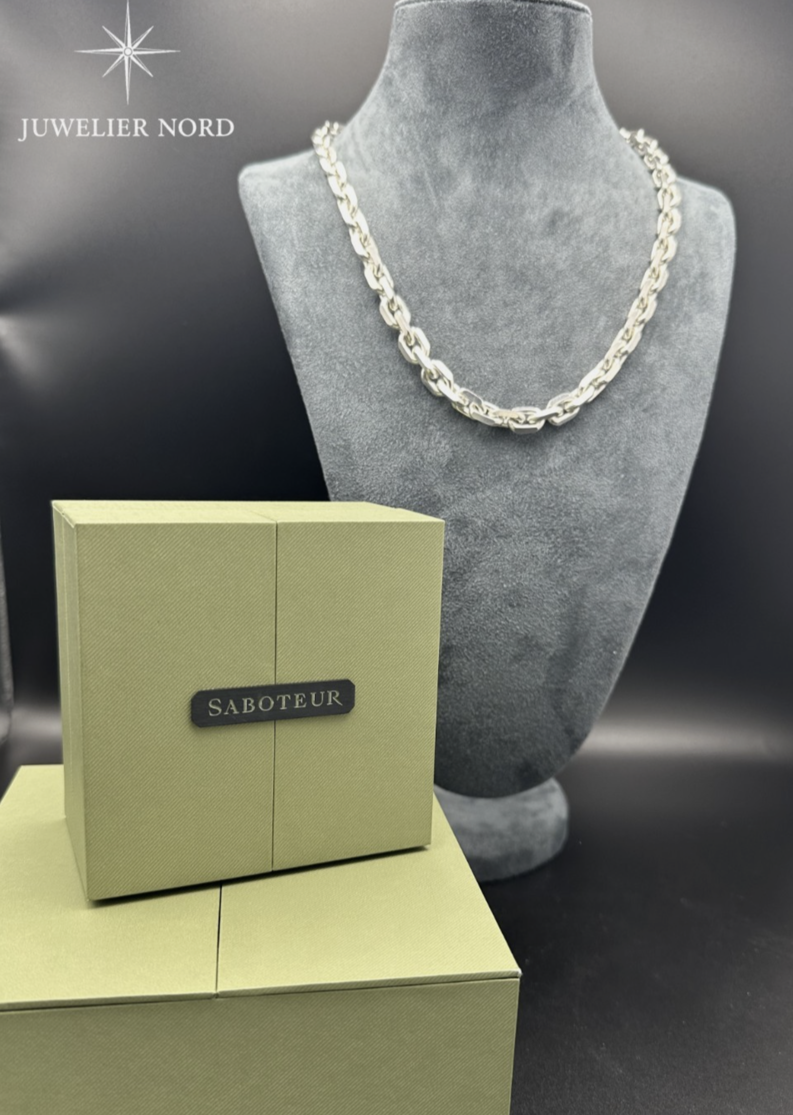 Tall slender porcelain bottle with natural clay textured body and cork stopper.